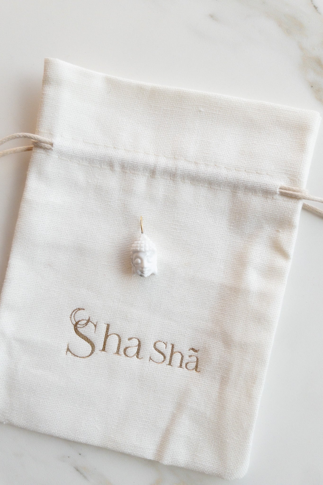 Hand carved Buddha pendant - Howlite - DIVYA Sacred symbols - shasha jewelry
