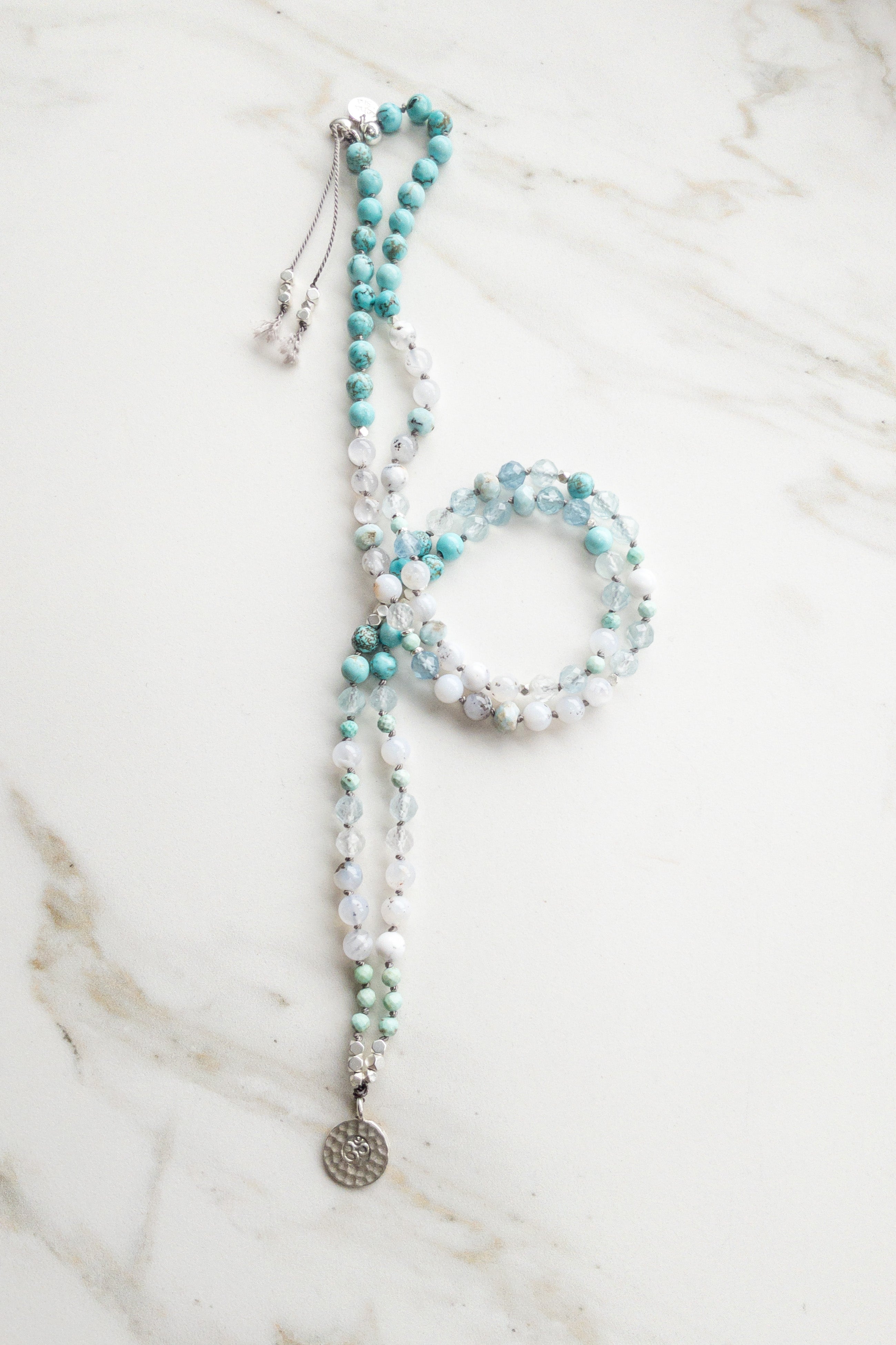 Celestial Serenity Mala Necklace - OM - Indradhanush - turquoise larimar - shashā yoga and meditation jewellery Hand knotted in Switzerland 