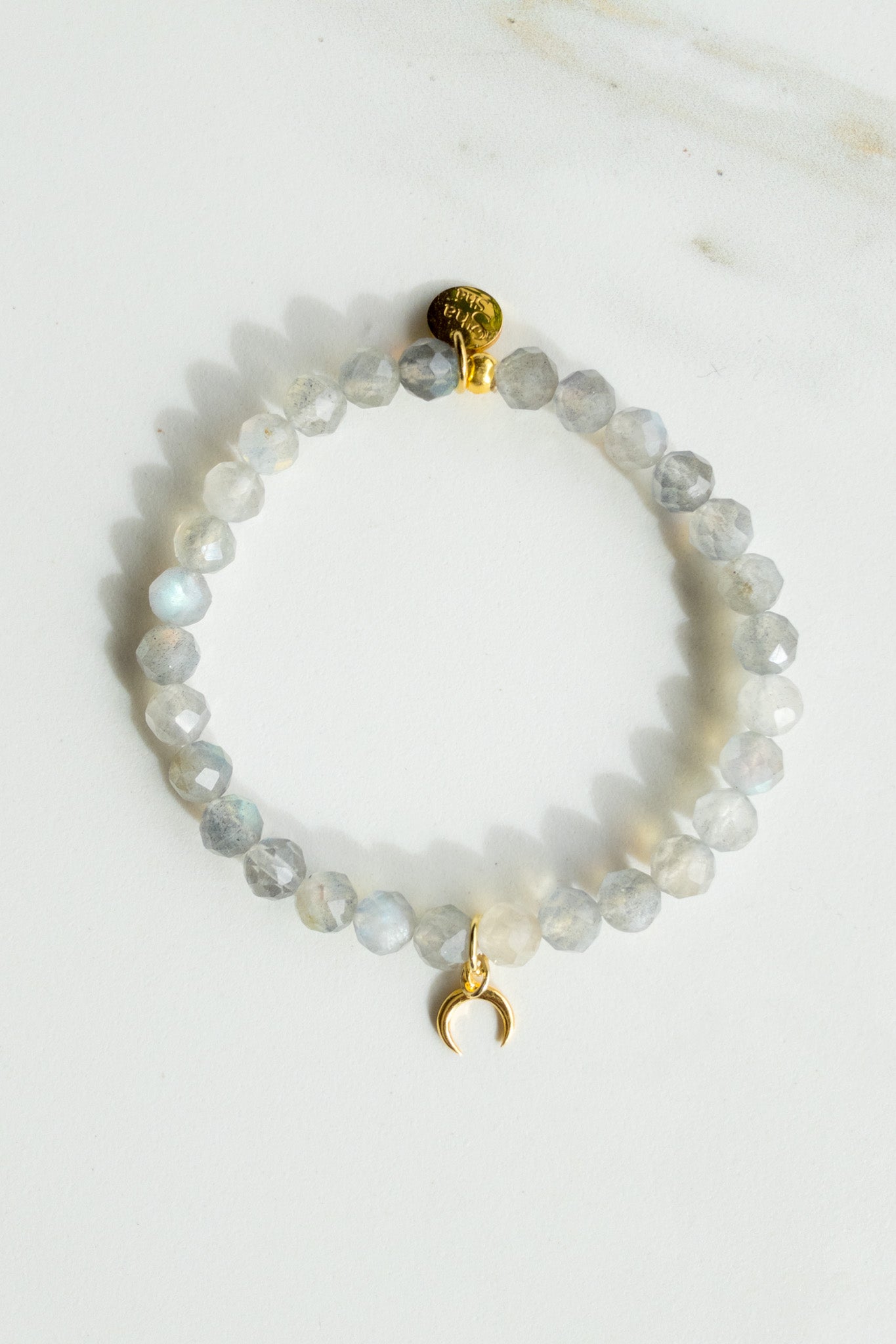 Light labradorite and vermeil 24k crescent moon bracelet - shashā jewellery Switzerland 