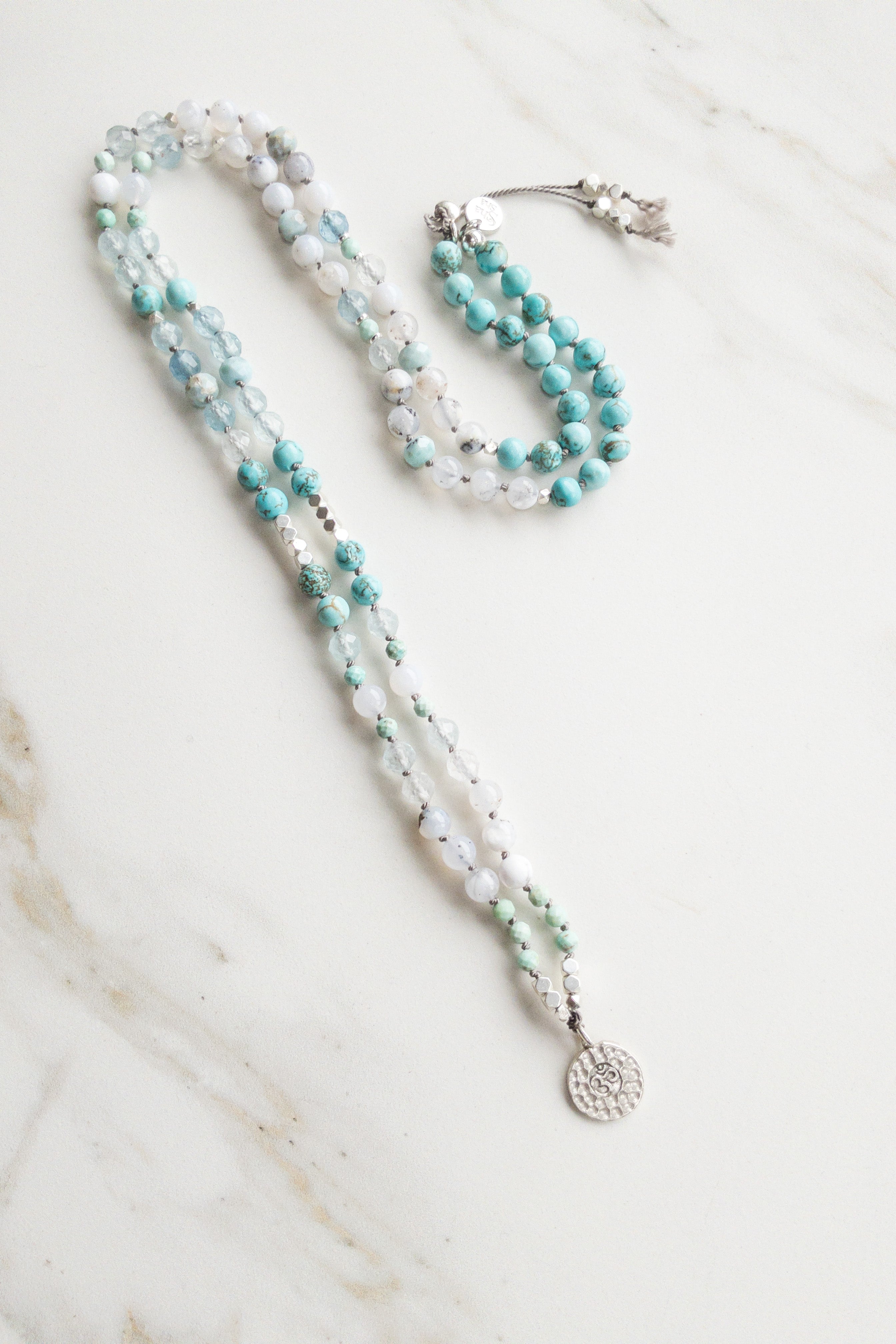 Celestial Serenity Mala Necklace - OM - Indradhanush - turquoise larimar - shashā yoga and meditation jewellery Switzerland 