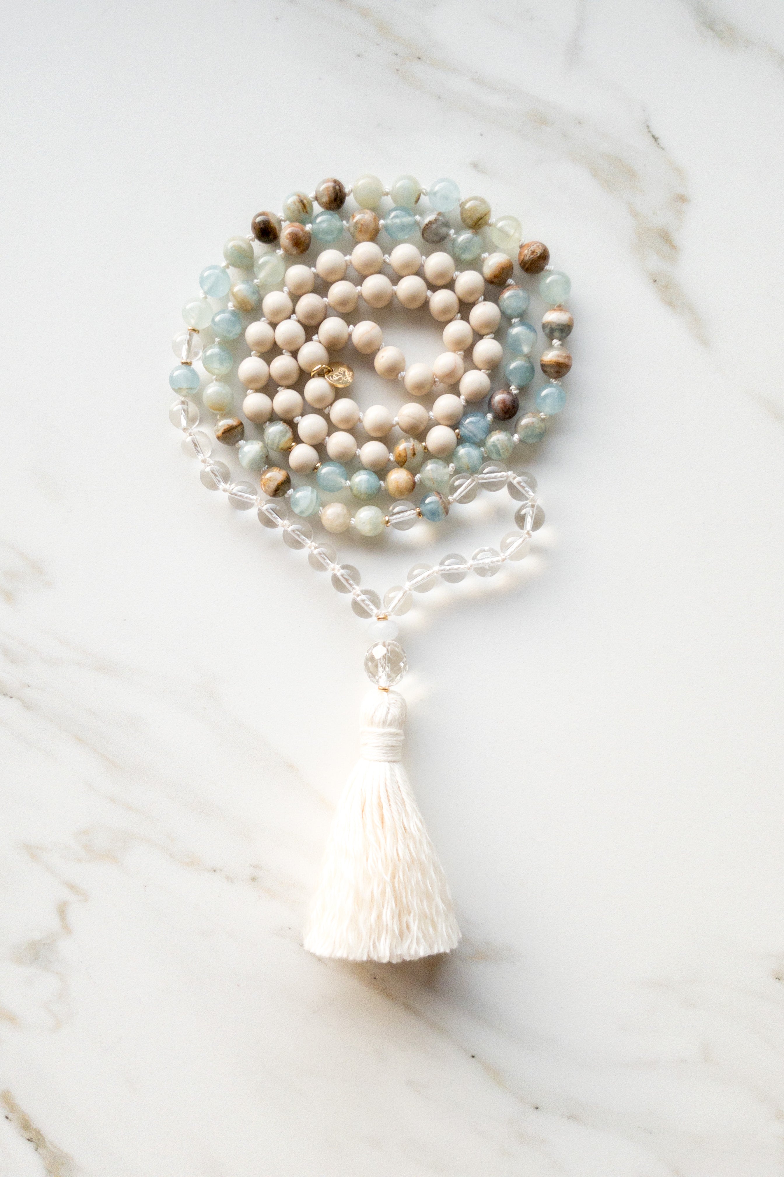 Dream of Gaia Mala - calcite, clear quartz, fossil stone - OceanEye Collection - shashā jewellery 