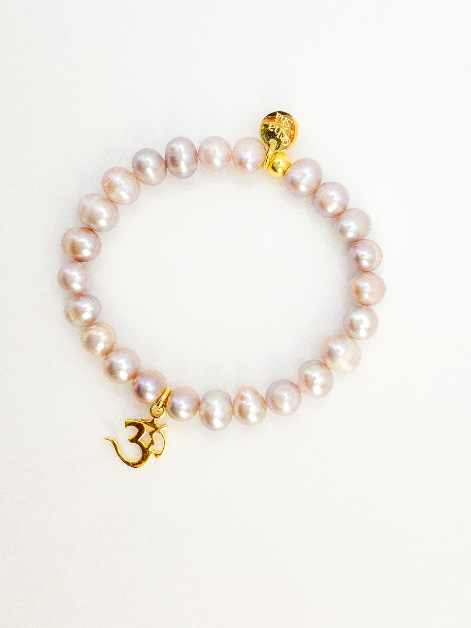 Freshwater Pearls and 24k gold plated "OM"charm Bracelet ShaSha Jewellery switzerland